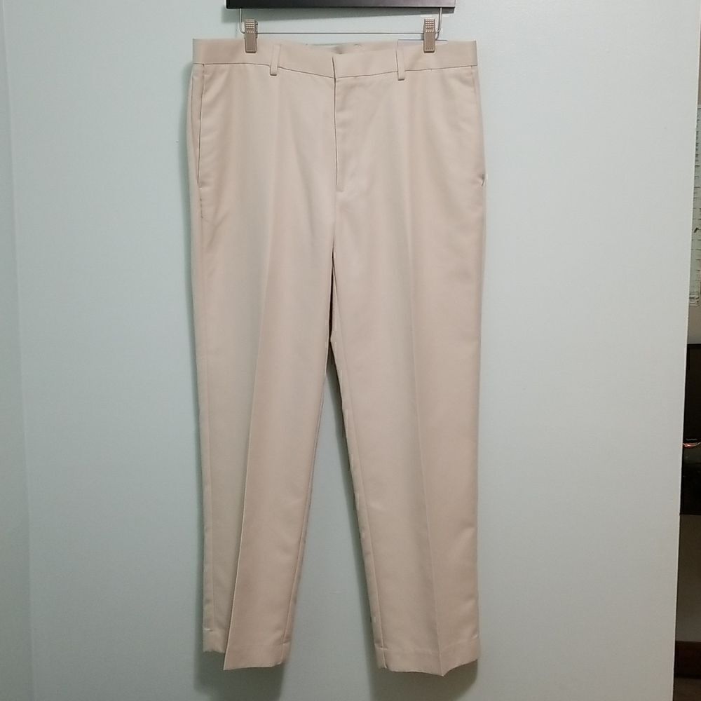 Axist creamish tan dress pants. Size 36/29. New.